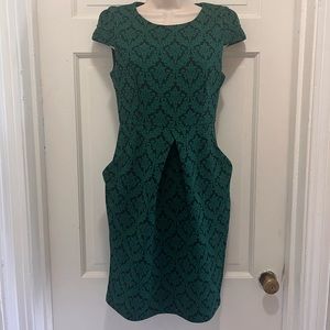 Green and black patterned dress by darling. Size XS With pockets